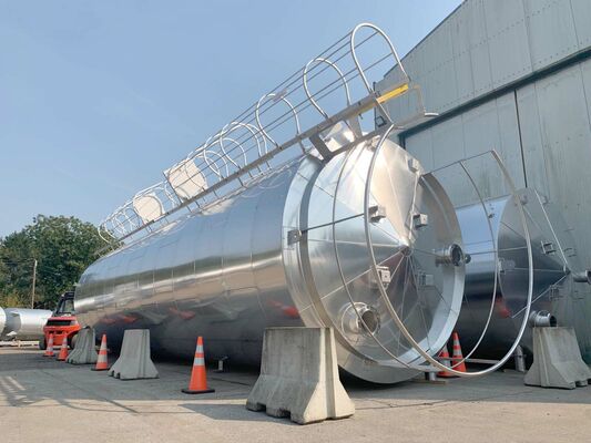 2 x New 105.000L stainless-steel AISI304L vertical storage tanks.